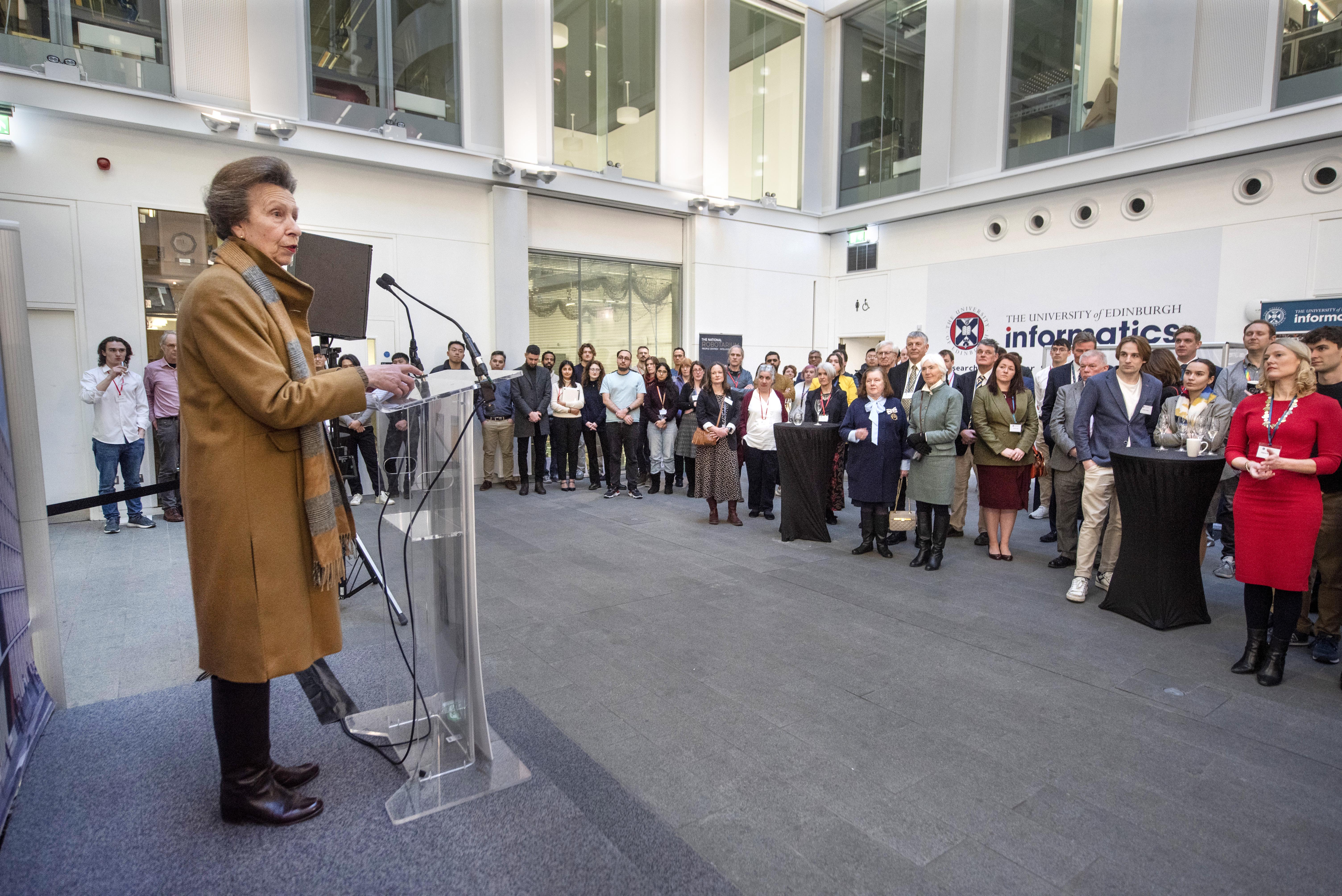 Photograph off The Princess Royal speaking to colleagues from School of Informatics