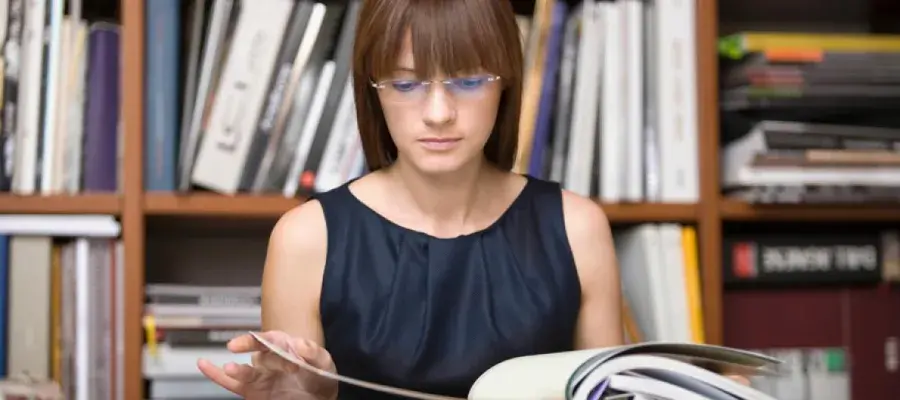 Female student reading a book