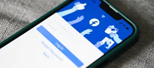 Facebook application icon on smartphone with login home page facebook logo icon on the screen popular social media network