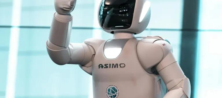 Image of the Honda Asimo robot waving