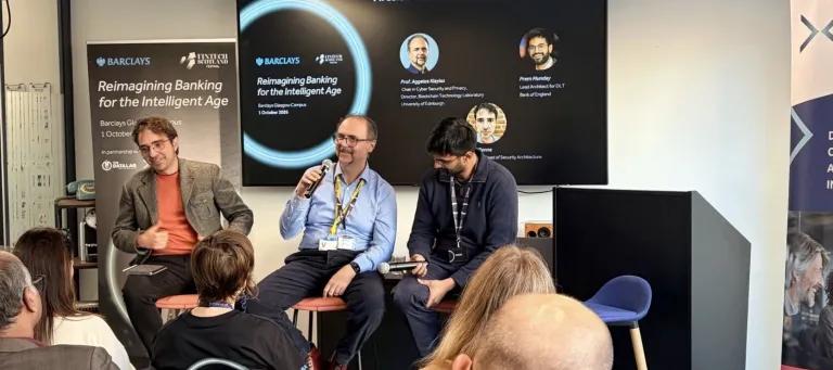 Professor Aggelos Kiayias speaking during the “Battle of the Golden Ledger” fireside chat at Barclays’ Reimagining Banking for the Intelligent Age event in Glasgow.