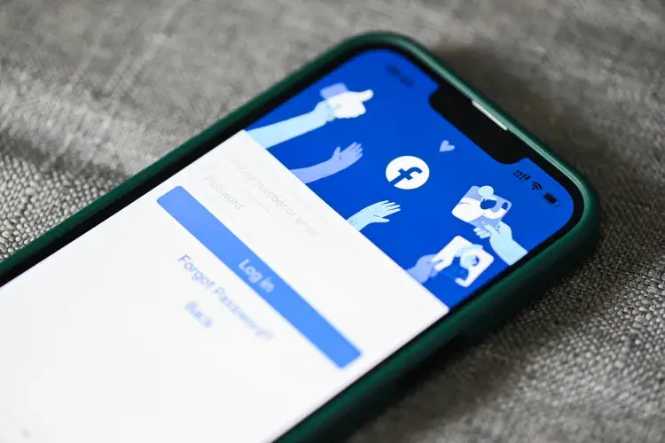 Facebook application icon on smartphone with login home page facebook logo icon on the screen popular social media network