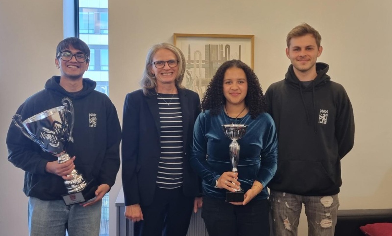 Trophy handover between Head of School Professor Helen Hastie and Aliya Mosha, incoming President of Edinburgh University Formula Student (EUFS), marking the team’s eighth consecutive FS-AI Overall win at FSUK 2025.