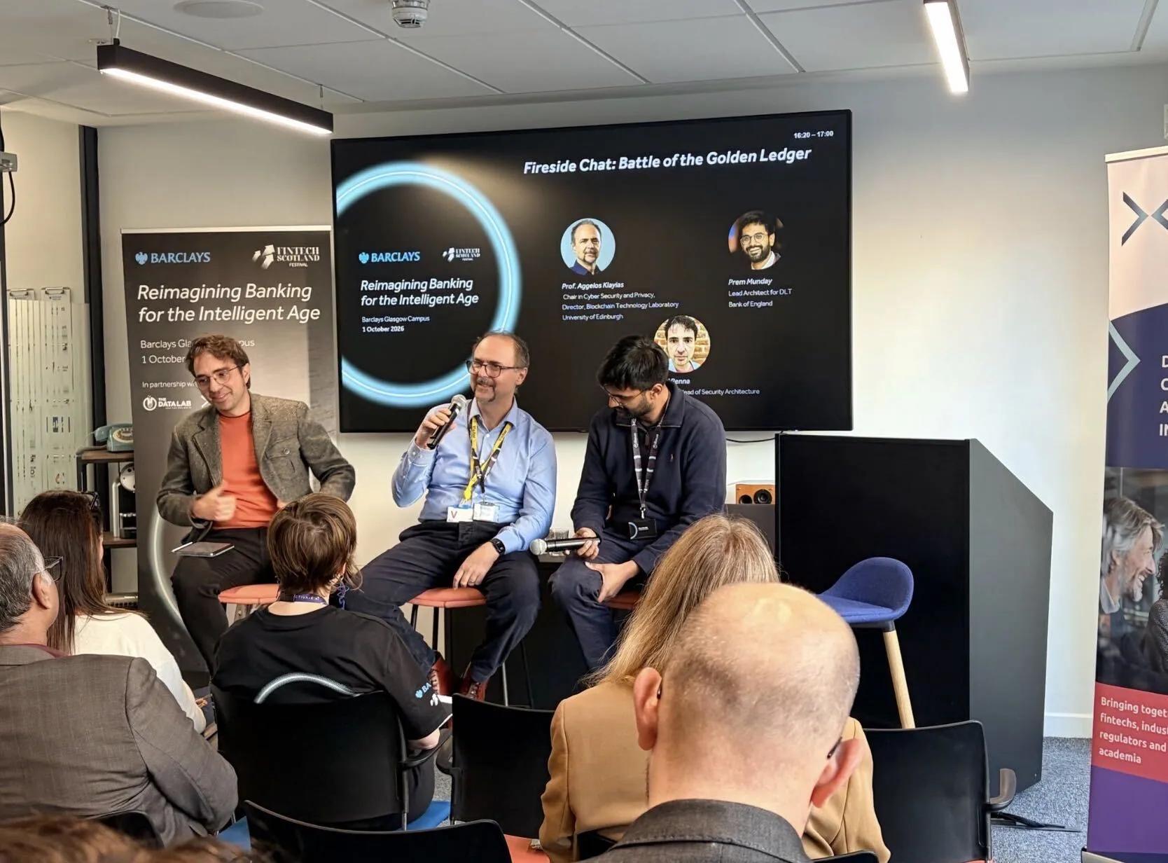 Professor Aggelos Kiayias speaking during the “Battle of the Golden Ledger” fireside chat at Barclays’ Reimagining Banking for the Intelligent Age event in Glasgow.