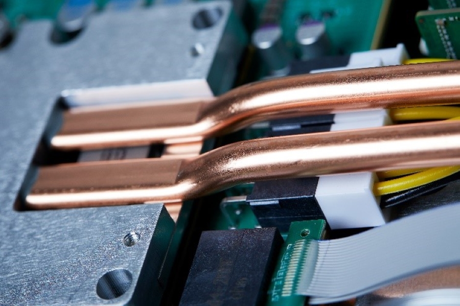Photo of computer hardware including copper wires.
