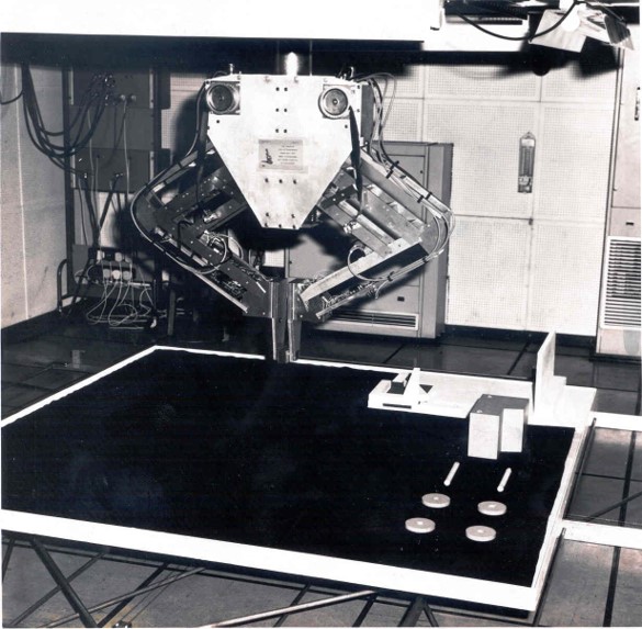 Black and white photo of an early robotic arm
